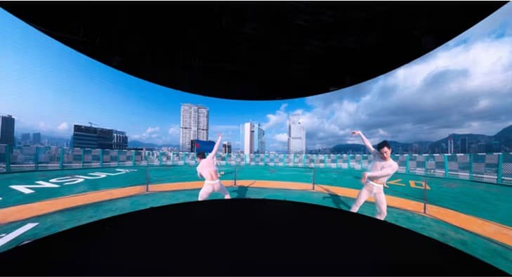 Wayne McGregor On The Other Earth — dancers on a rooftop helipad in panoramic projection